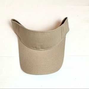 Beige unisex visor cap.